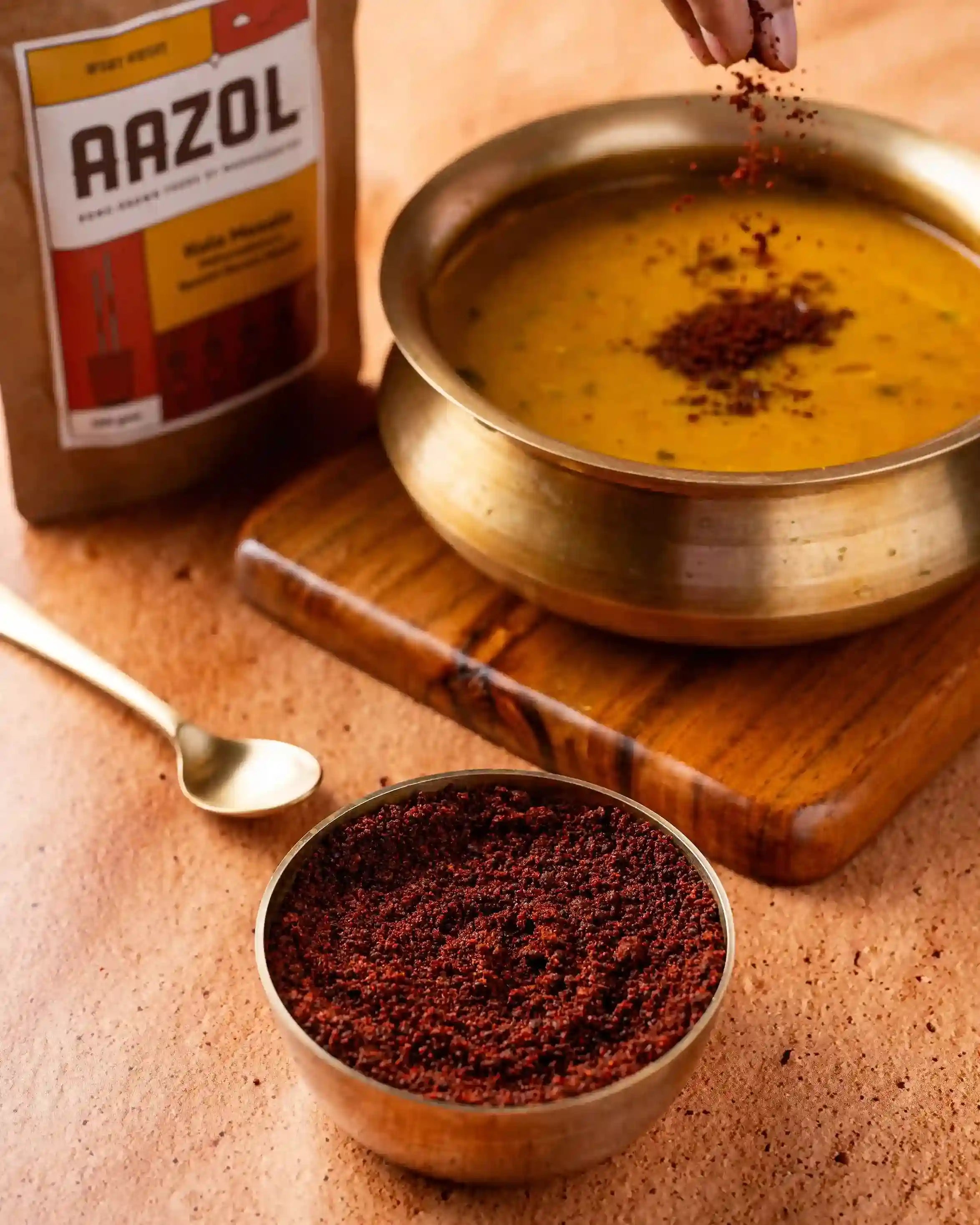 Aazol's Kala Masala (Premium All-purpose Masala) sprinkled over dal