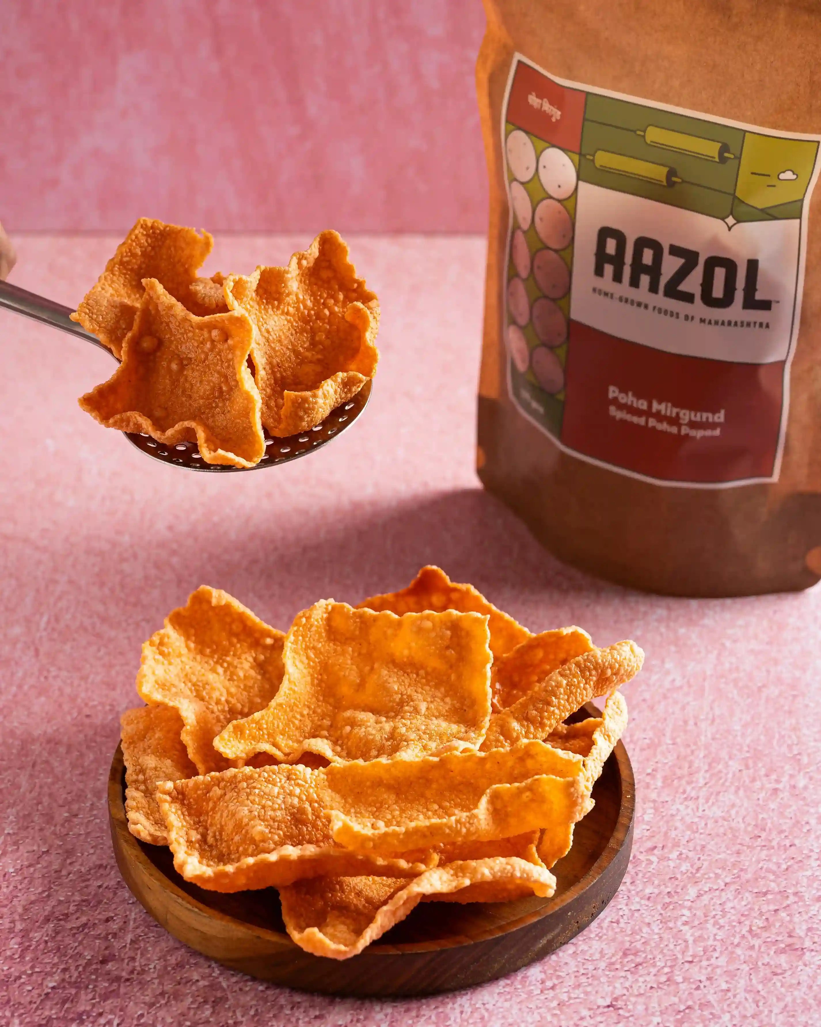 Aazol's Spiced Poha Papad (Poha Mirgund) being served